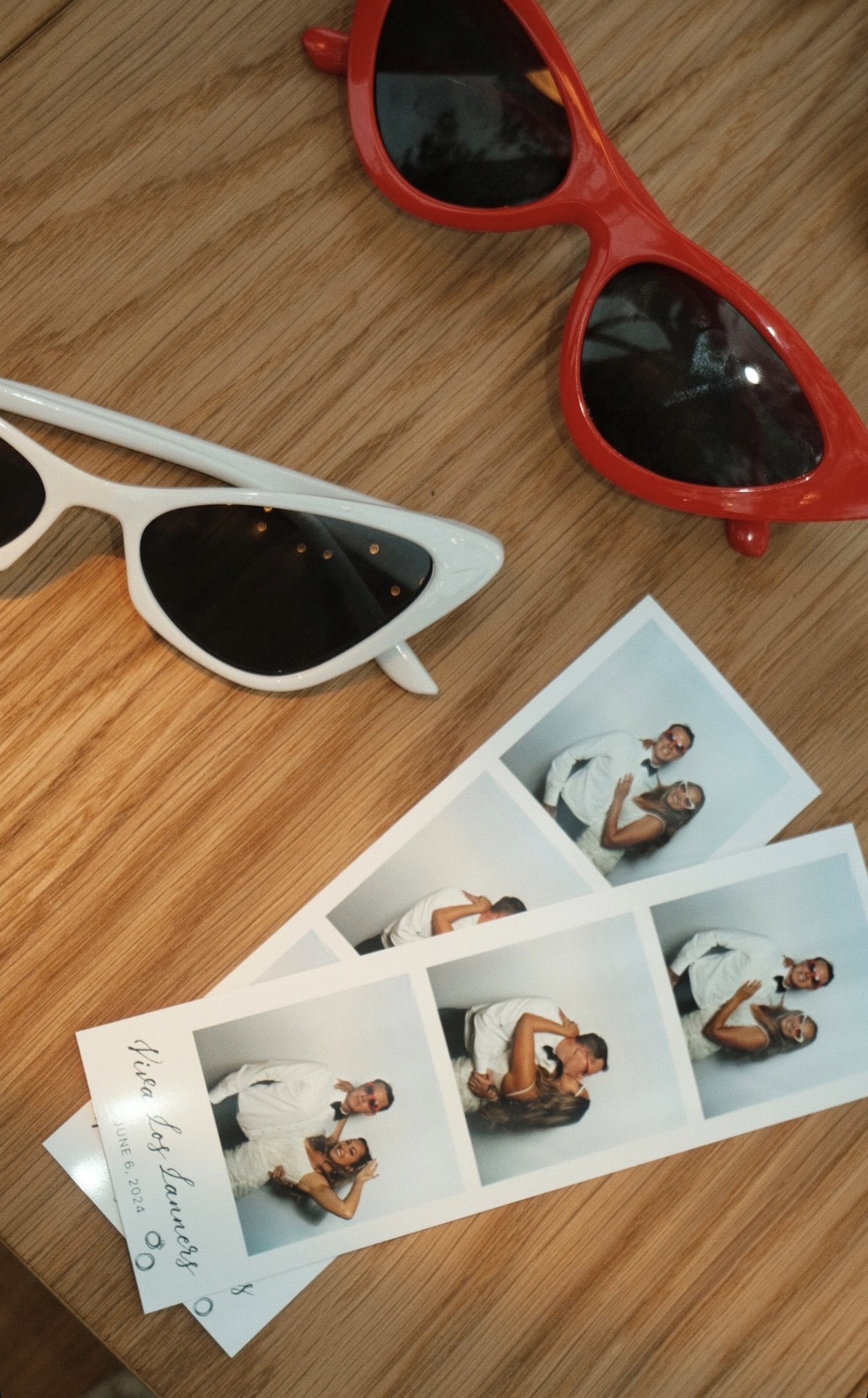 Photo booth prints and props display